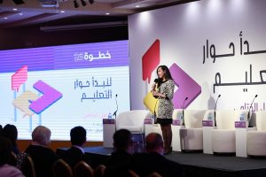 HQSF alumnus Hend Tubila welcomes guests during the closing ceremony of Sparking Dialogue on Education, which was held in Ramallah in April 2018.