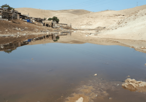 The wastewater from the settlement flooded large areas of Khan Al-Ahmar lands, as settlers attempt to aid their government in its drive to force the village residents to leave. Photo courtesy of Middle East Monitor.