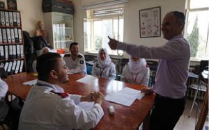 Nasrallah Khalileh delivers a lesson on the causes of avoidable blindness in Palestine with the Sir Stephen Miller School of Nursing class of 2018.