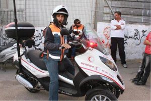 A special motorcycle ambulance can reach patients easily. 