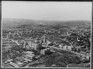 The King David Hotel and YMCA were the symbols of cosmopolitan Mandate Jerusalem and the gateways to the sprawling western suburbs of Qatamon, Talbiya, and Baqa’a.