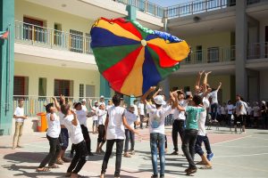 Children playing a game during a risk-education session in Gaza. Photo credit: @UNMAS.