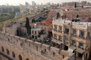 The Wall of Jerusalem with the Imperial Hotel that is battling its illegal sale to Jewish settlers. Photo courtesy of Palestine Image Bank.